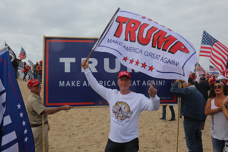 Trump Supporter Waving MAGA Flag