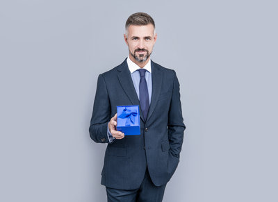 Business Man Offering Gift