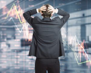 Stock Broker Looking at Share Price Crash